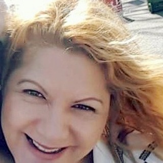 Portrait of Iria Scope, licensed massage therapist